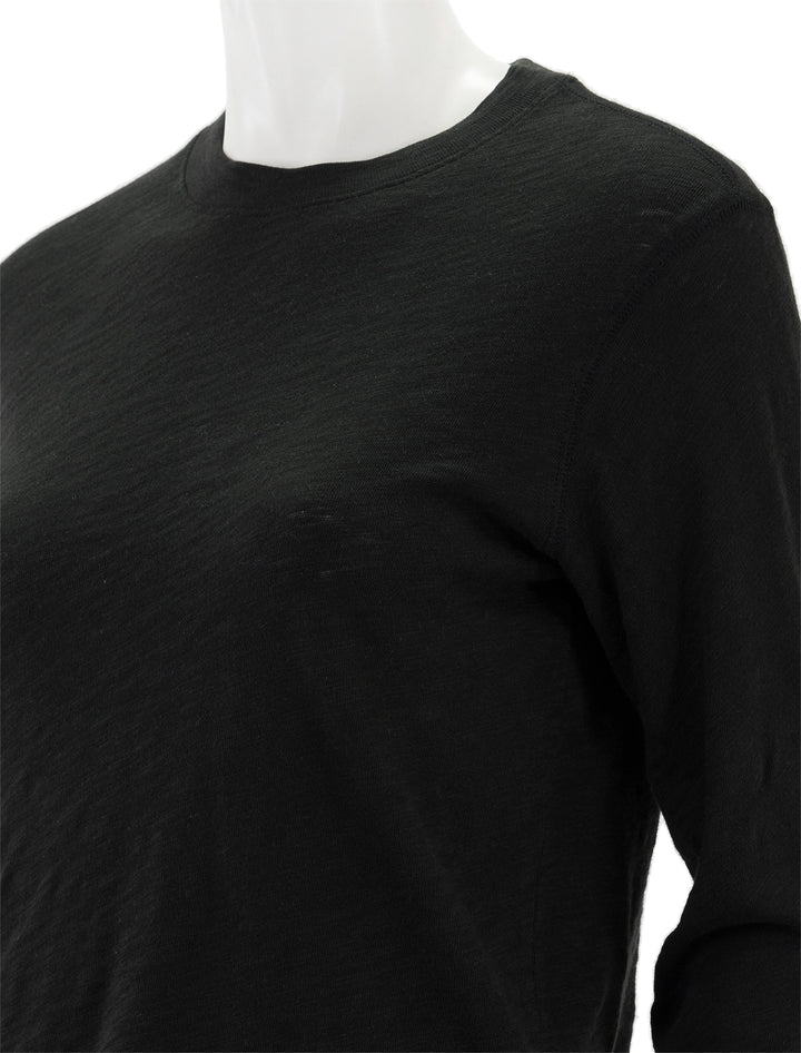 Close-up view of ATM's slub jersey long sleeve destroyed crop tee in black.