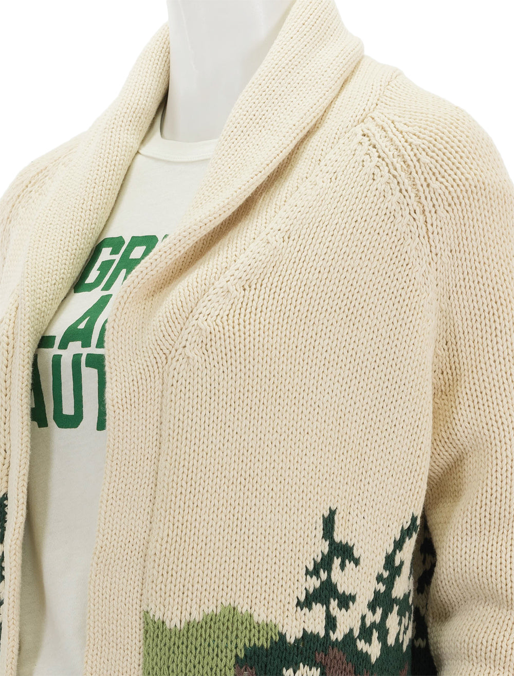 Close-up view of The Great's the camp lodge cardigan in cream.