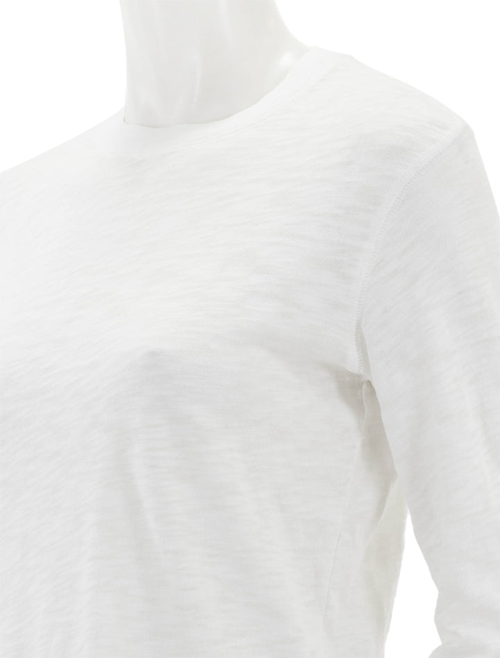 Close-up view of ATM's slub jersey long sleeve destroyed crop tee in white.