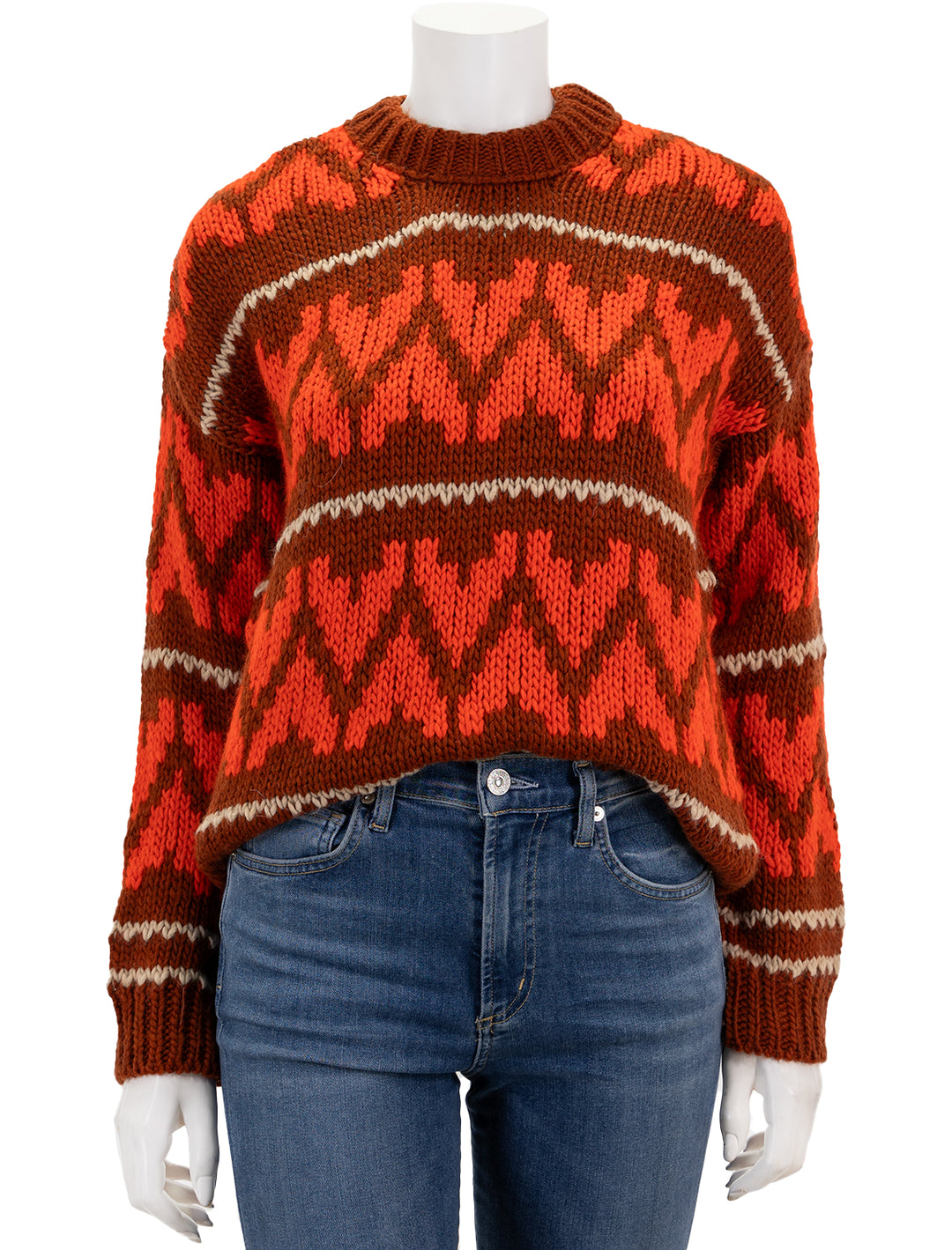 Front view of The Great's the folk pullover in firestone.