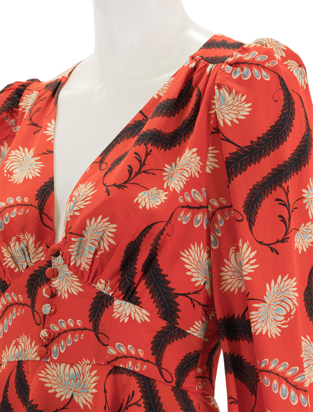 Close-up view of Rhode's bronson top in bright red kiku.