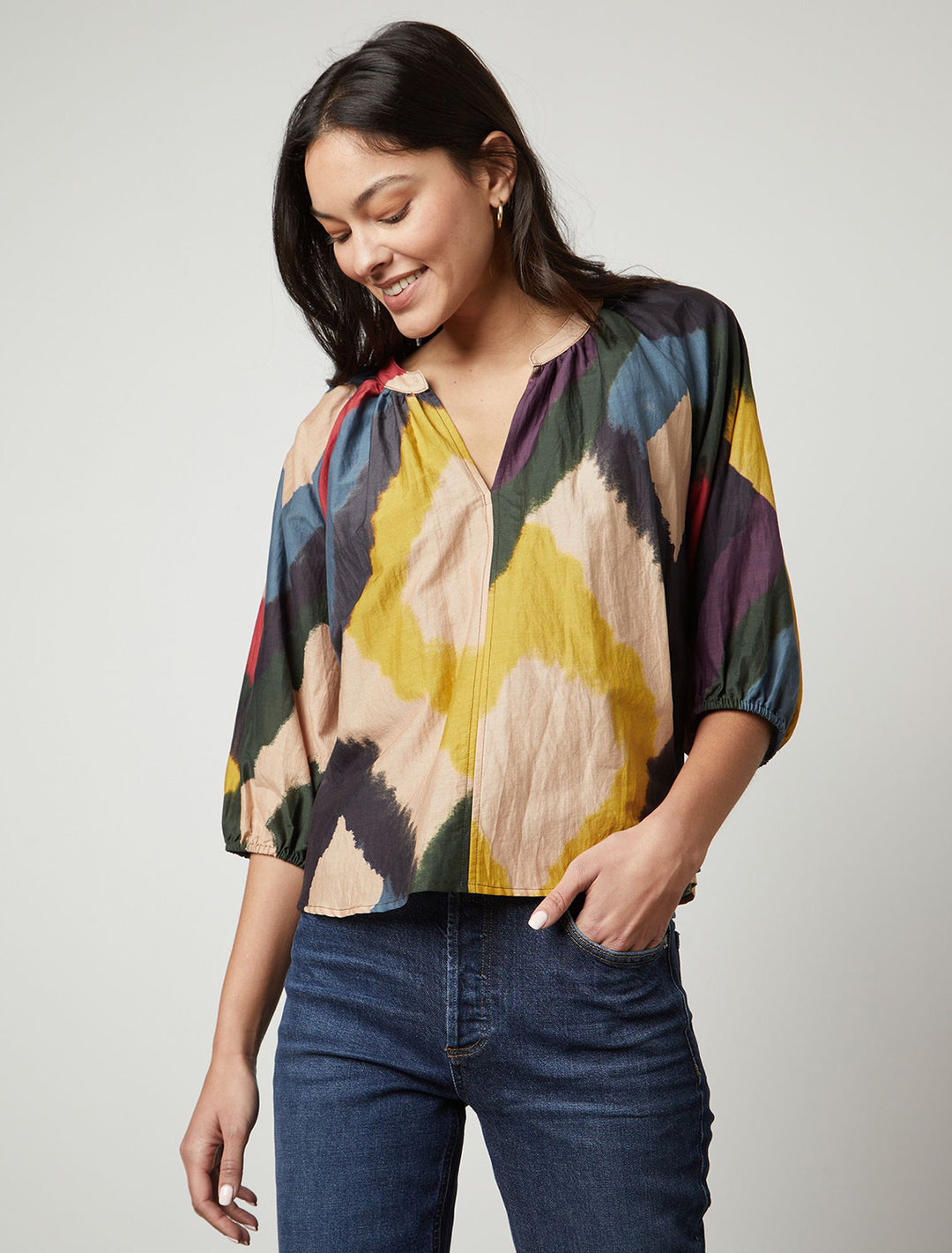 Model wearing Velvet's lizette top in chai multi.