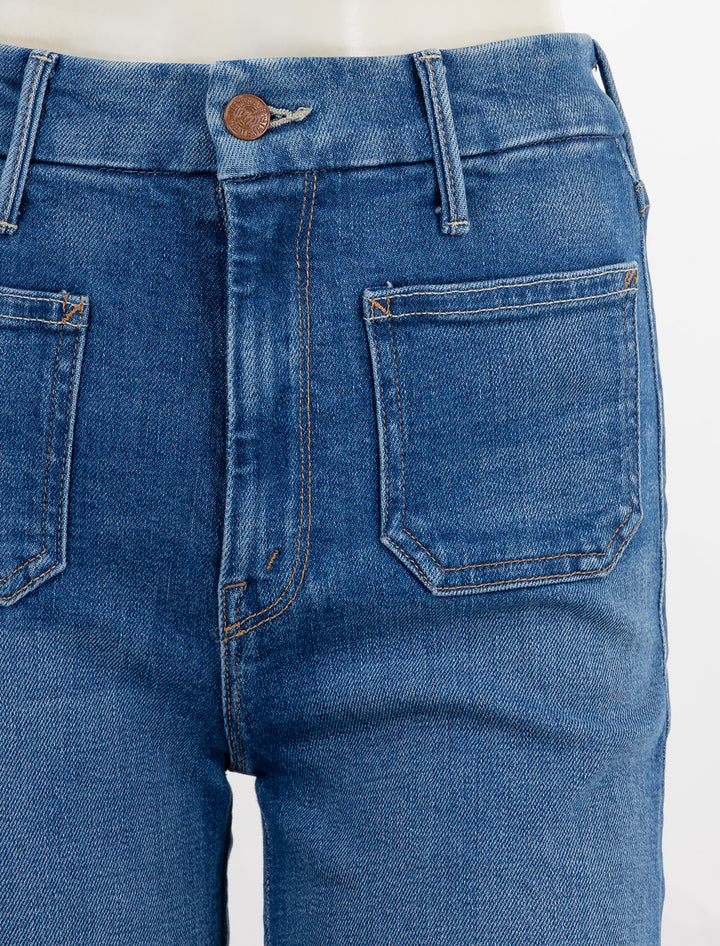 Close-up view of MOTHER Denim's the patch pocket roller in eager beaver.
