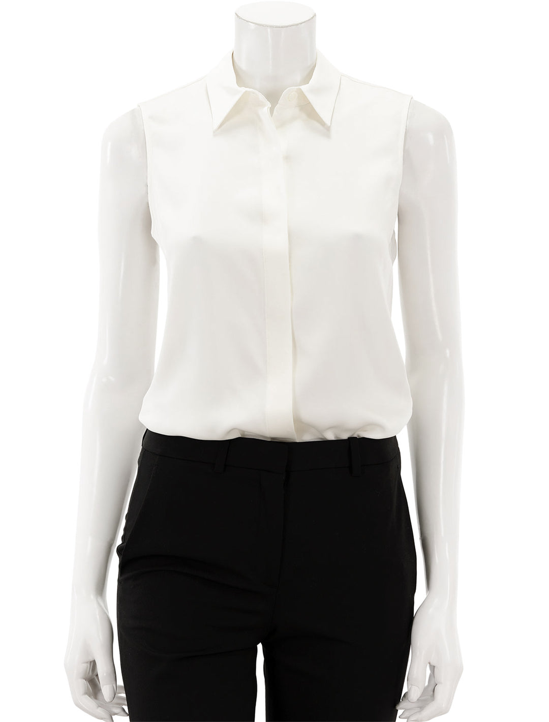 Front view of Theory's tanelis modern sleeveless blouse in ivory, tucked into a pair of dress slacks.