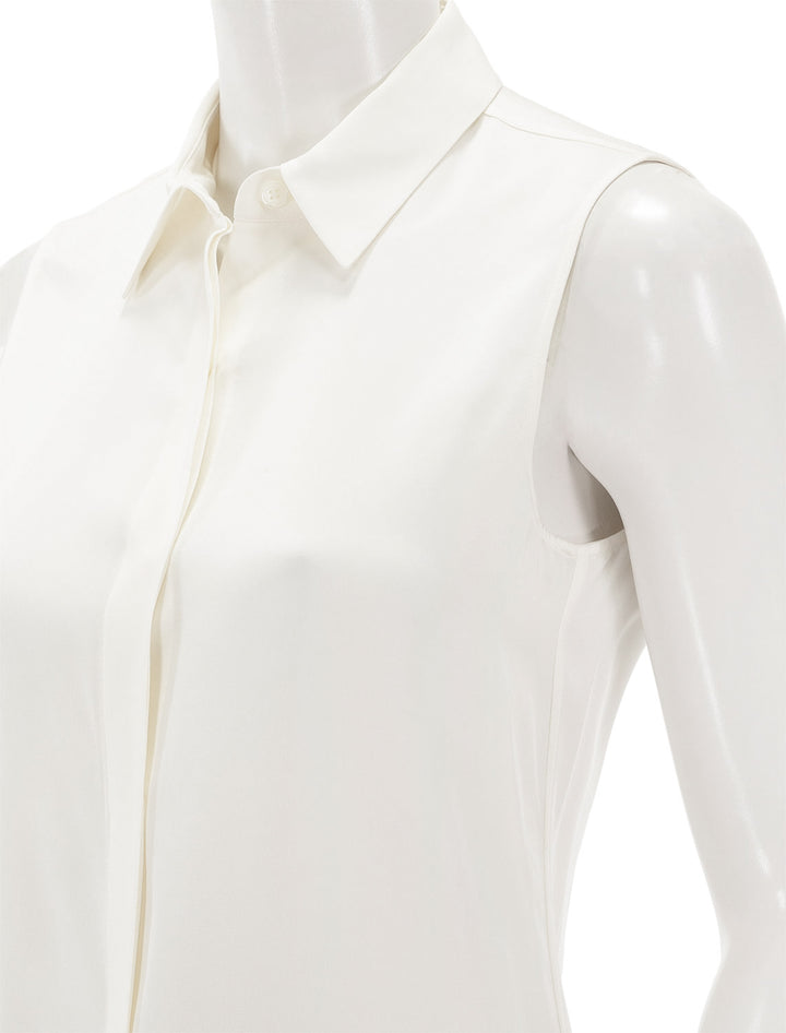 Close-up view of Theory's tanelis modern sleeveless blouse in ivory.