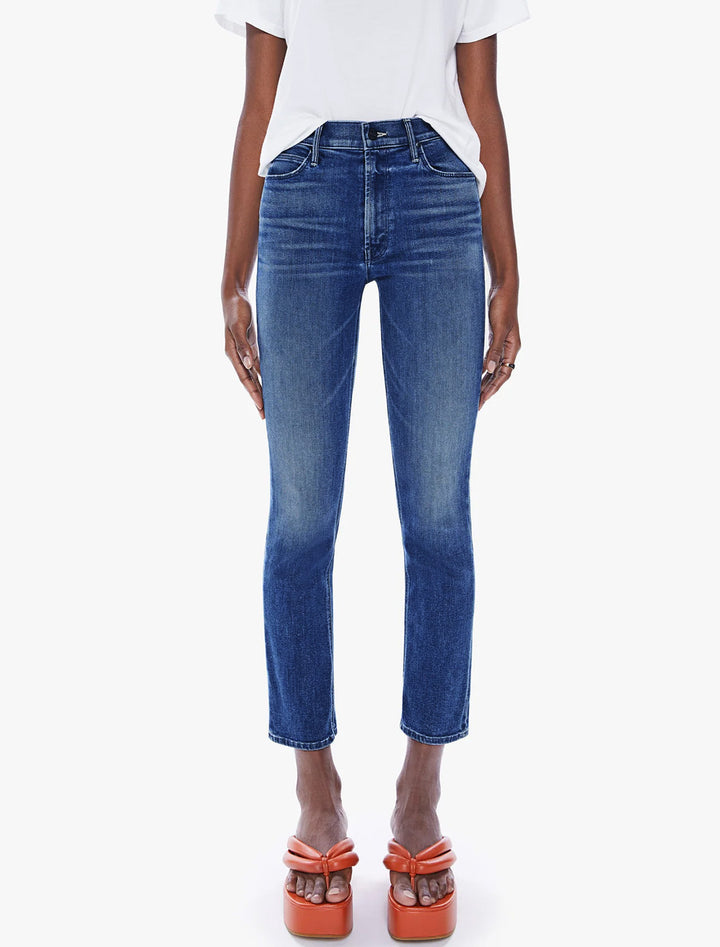 Model wearing MOTHER Denim's the mid rise dazzler ankle in wish on a star.