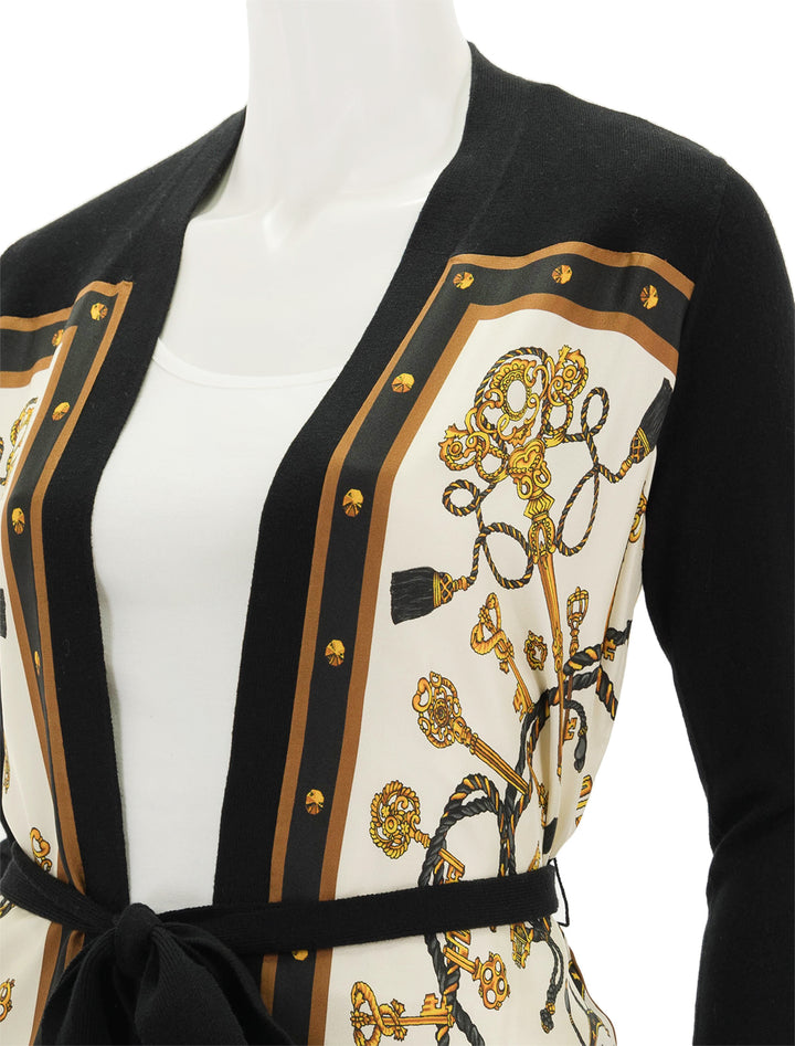 Close-up view of L'agence's beverly silk panel cardigan.
