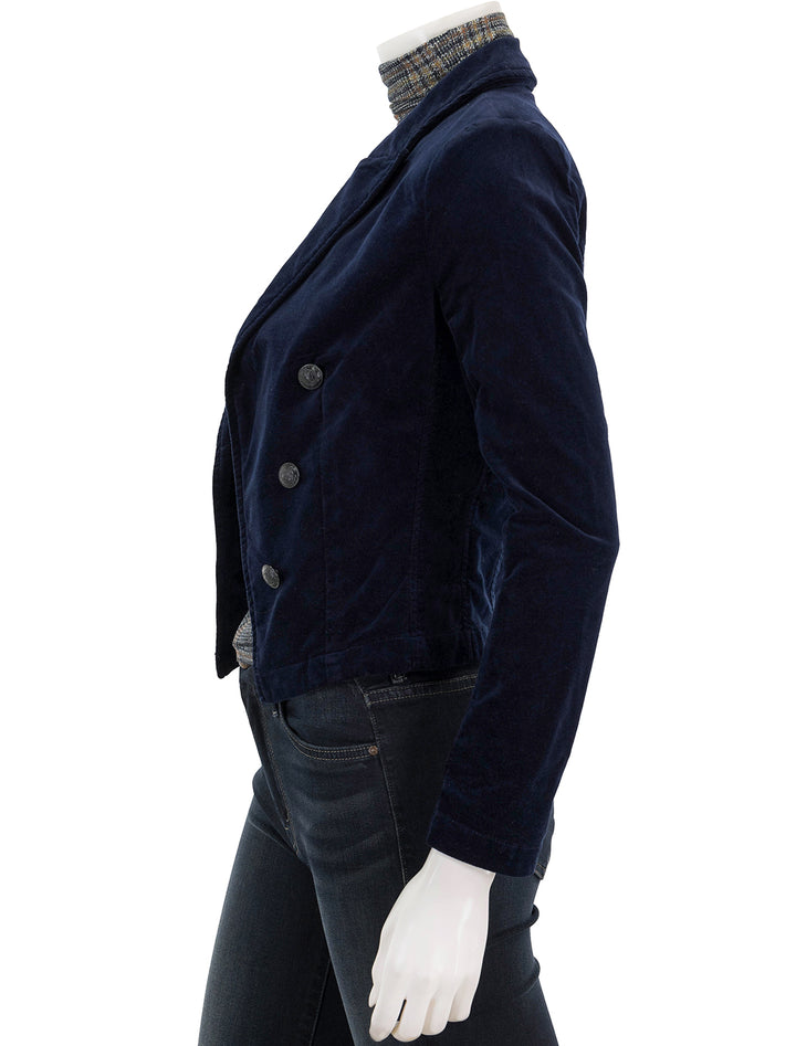 Side view of L'agence's wayne crop double breasted jacket in dark navy velvet.