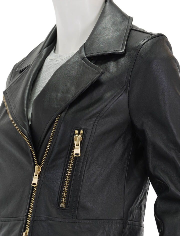 Close-up view of L'agence's onna cropped biker jacket in black.