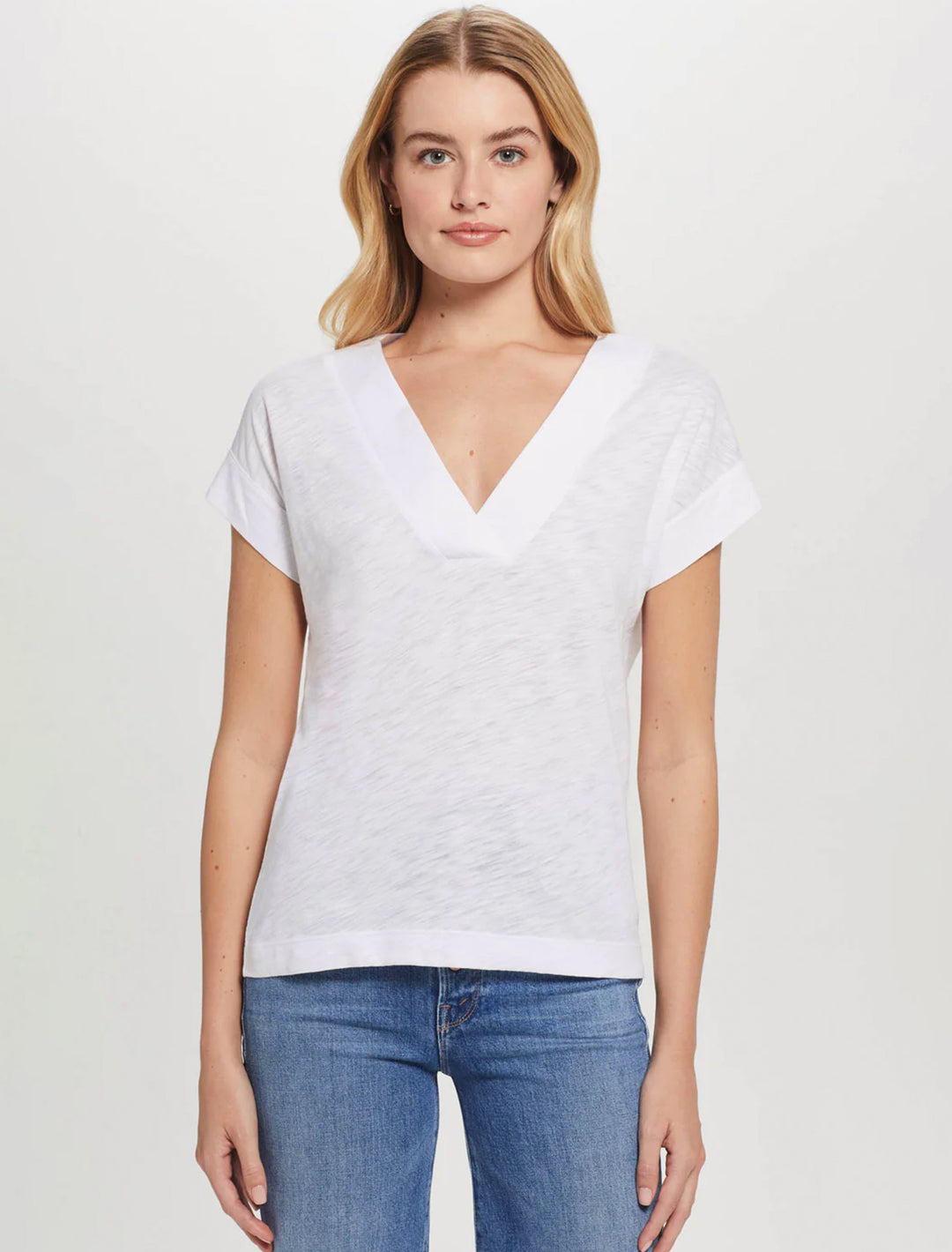 Model wearing Goldie Lewinter's mariana basic v neck in white.