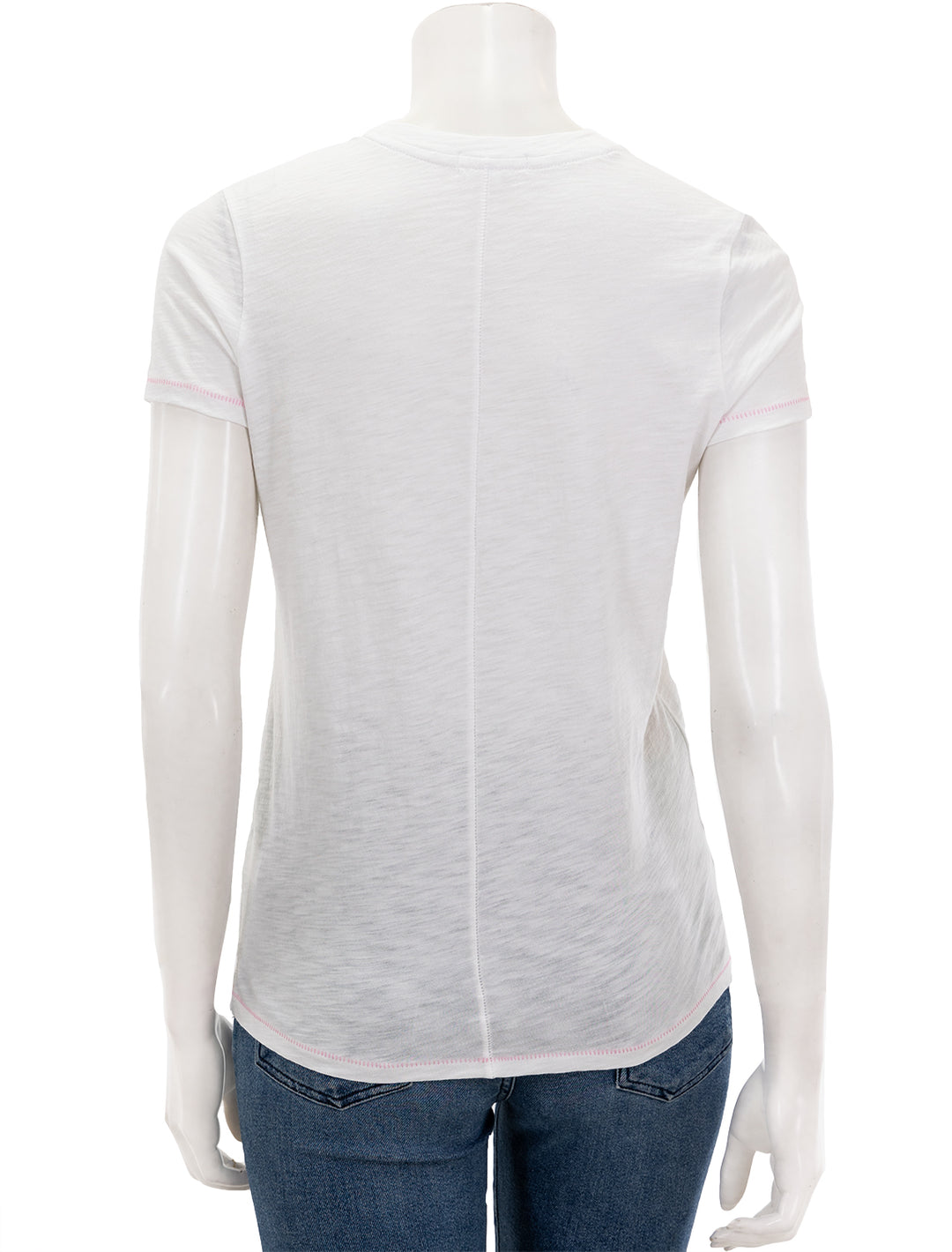 Back view of Goldie Lewinter's contrast stitch pocket boy tee in white and pink.