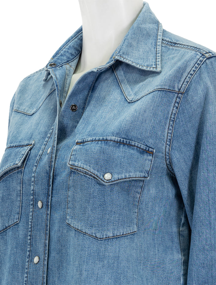 Close-up view of Citizens of Humanity's cropped western shirt in carolina blue.