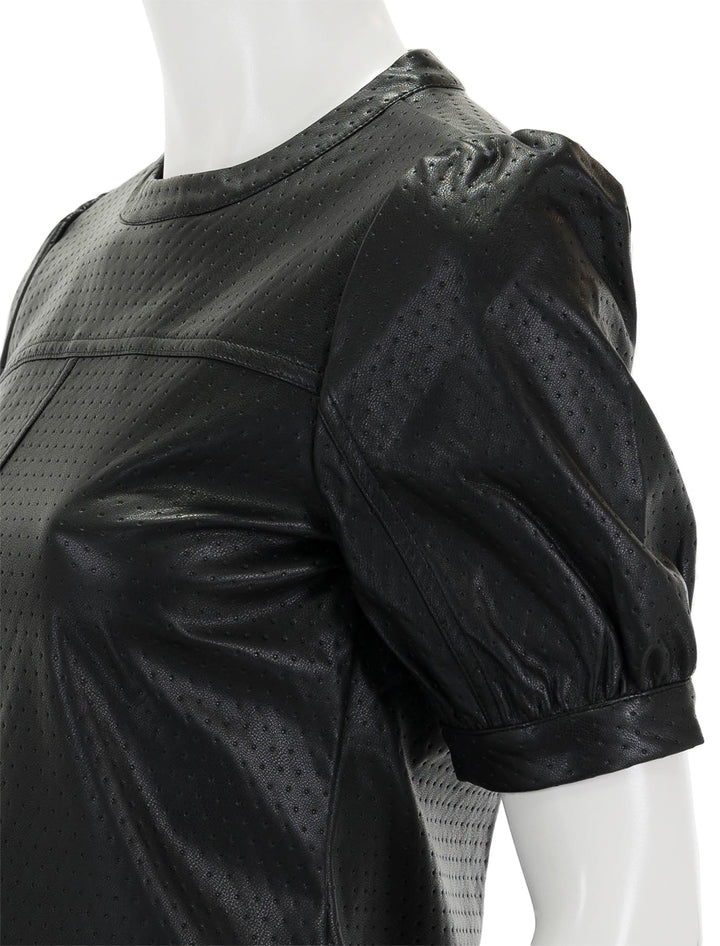 Close-up view of Steve Madden's miller top in black.