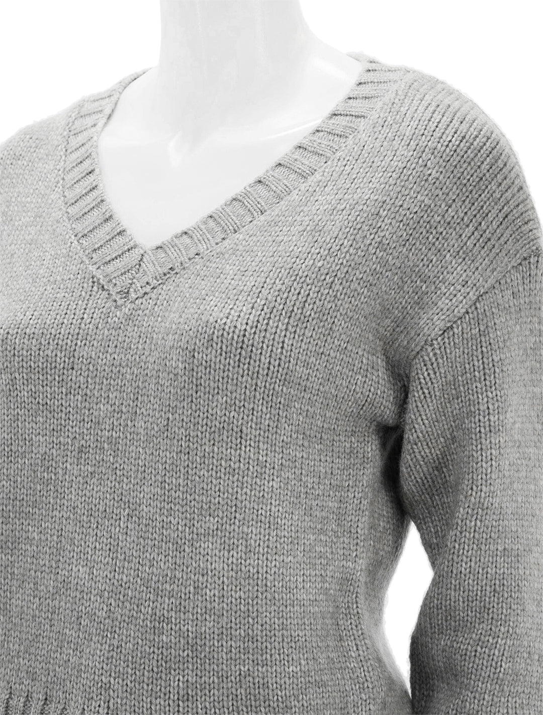 Close-up view of Steve Madden's houston sweater in heather grey.