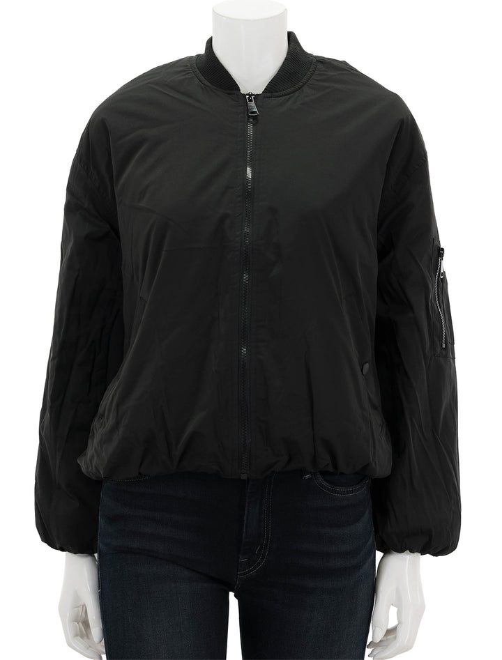 Front view of Steve Madden's vida jacket in black, zipped.