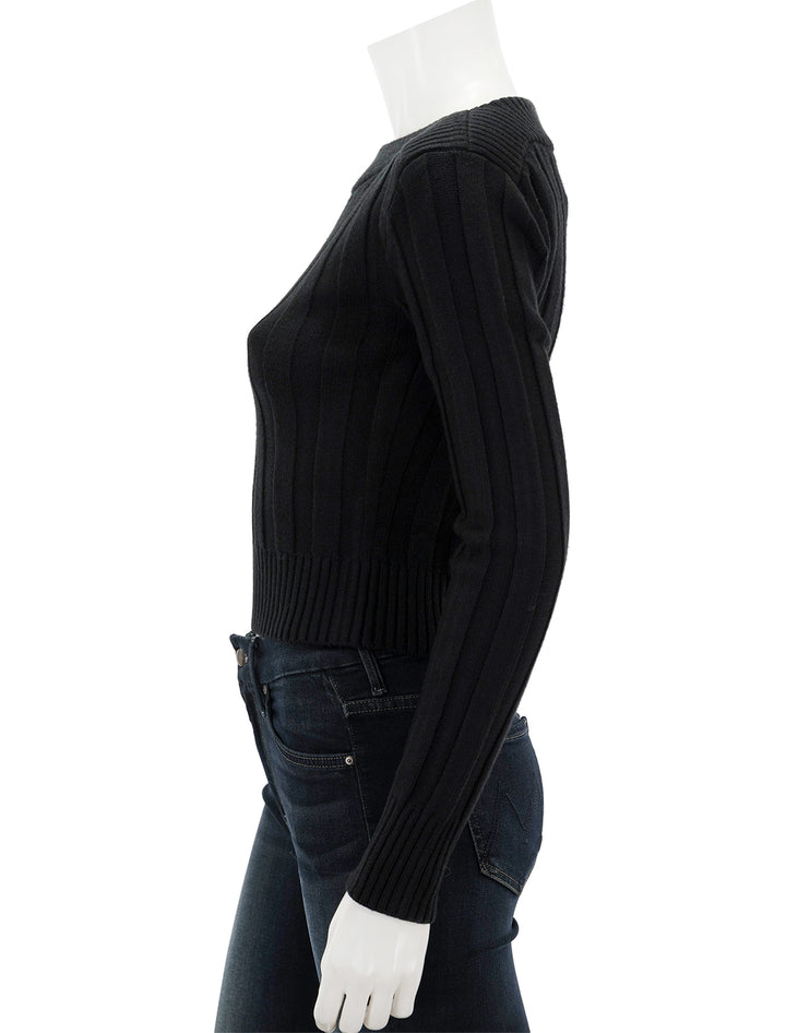Side view of Steve Madden's serra sweater in black.