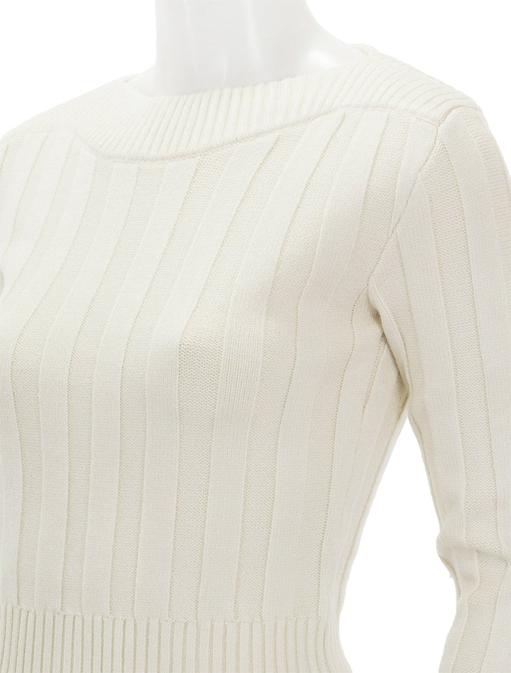 Close-up view of Steve Madden's serra sweater in dirty white.