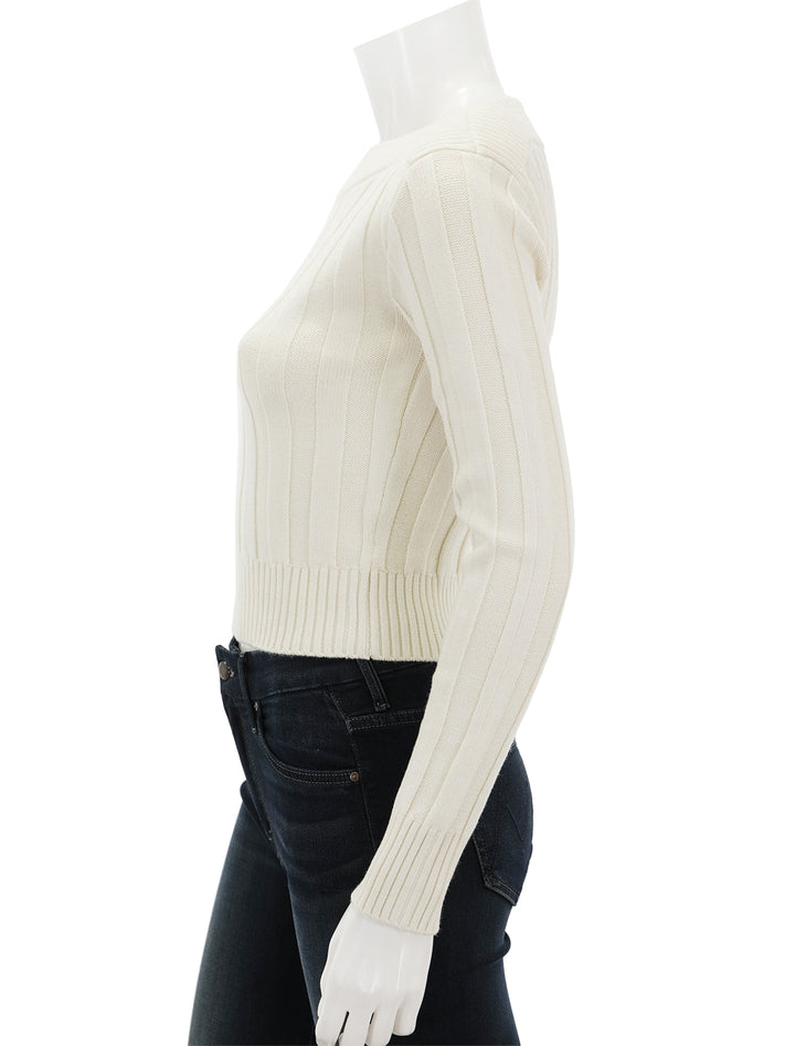 Side view of Steve Madden's serra sweater in dirty white.