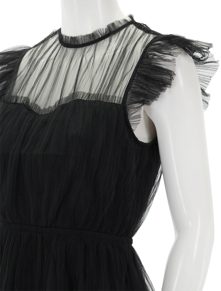 Close-up view of Steve Madden's sabina dress in black.