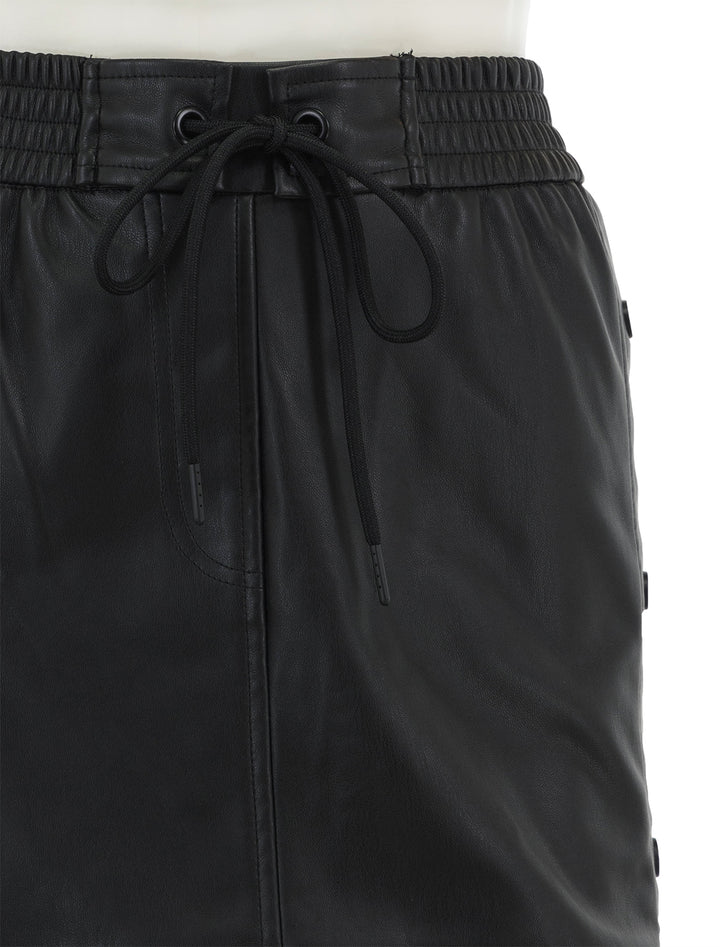 Close-up view of Steve Madden's carla skirt in black.