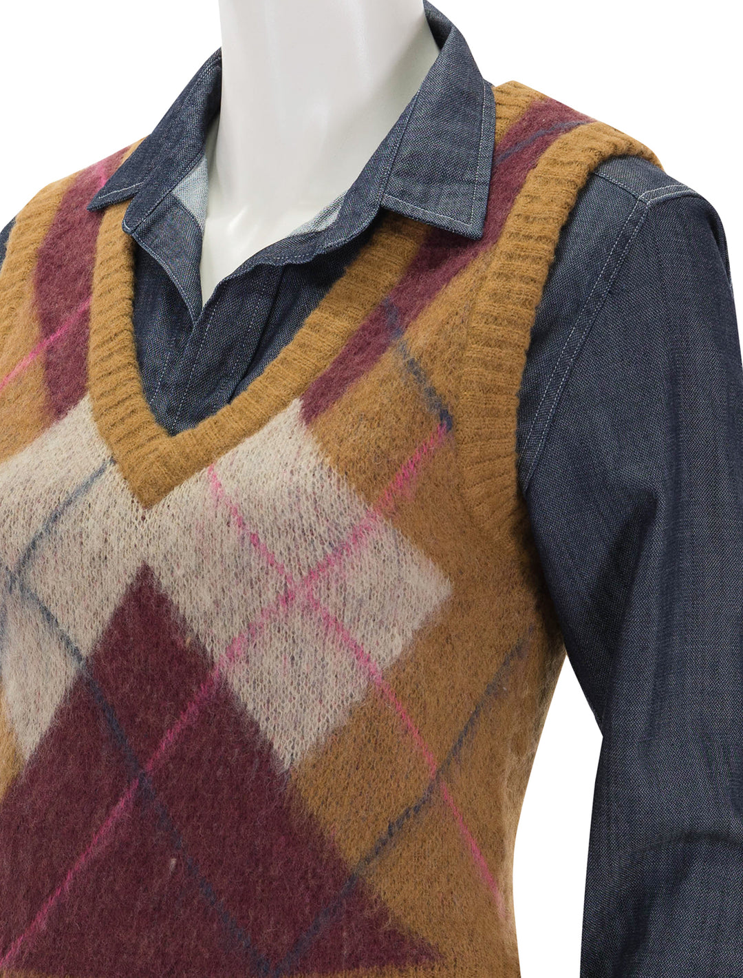 Close-up view of Steve Madden's ella sweater vest in tan argyle.