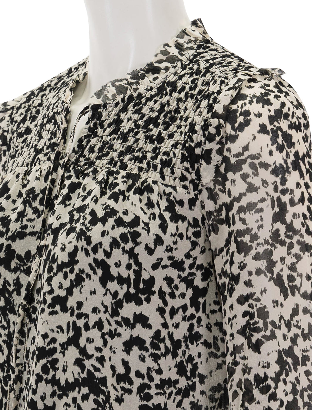 Close-up view of Steve Madden's drew top in black and ivory floral.
