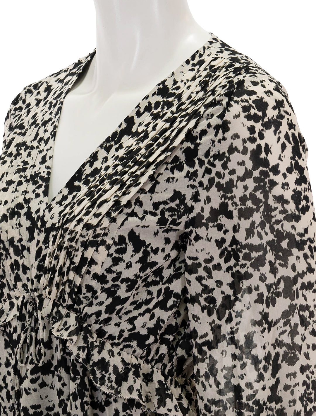 Close-up view of Steve Madden's rami dress in black and ivory floral.
