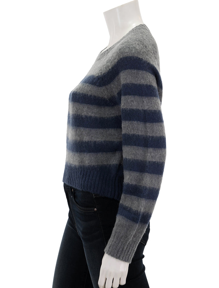 Side view of Steve Madden's lyon sweater in grey and navy stripe.