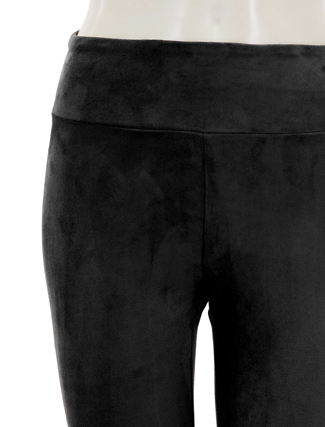 Close-up view of Splendid's vegan suede leggings in black.
