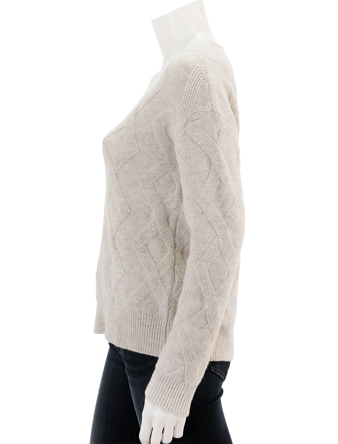Side view of Splendid's diamond cable vneck sweater in oat heather.