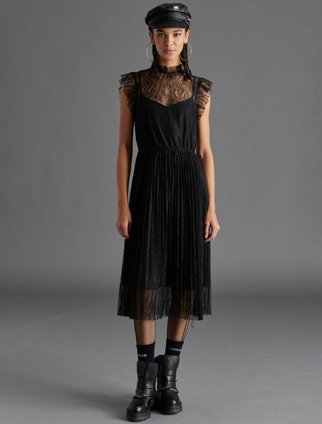 Model wearing Steve Madden's Izzo Dress in Black.
