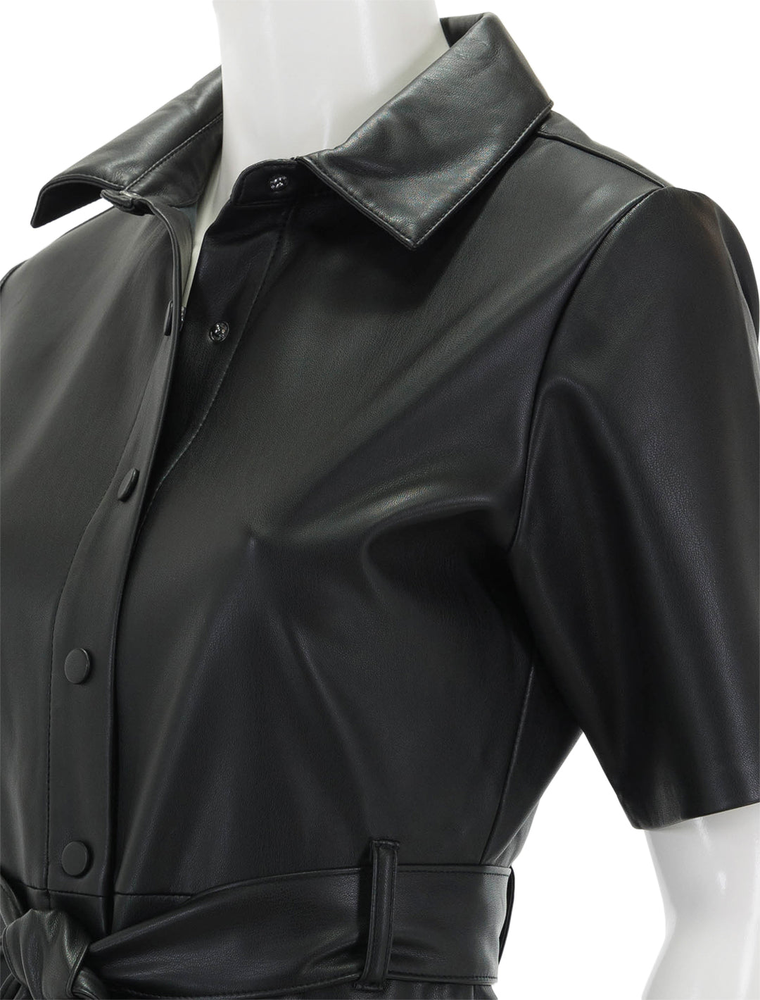 Close-up view of Steve Madden's jolene dress in black.