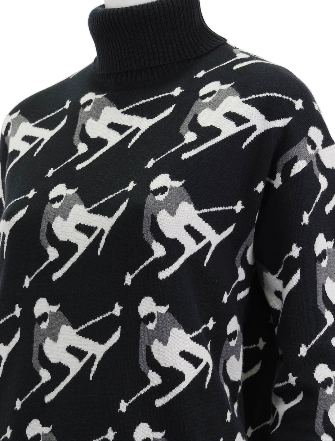 Close-up view of Alp N Rock's desi ski sweater in black.