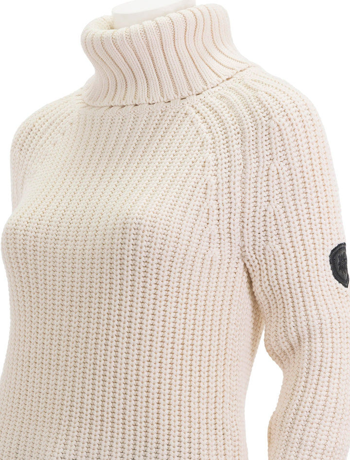 Close-up view of Alp N Rock's simone sweater in ivory.