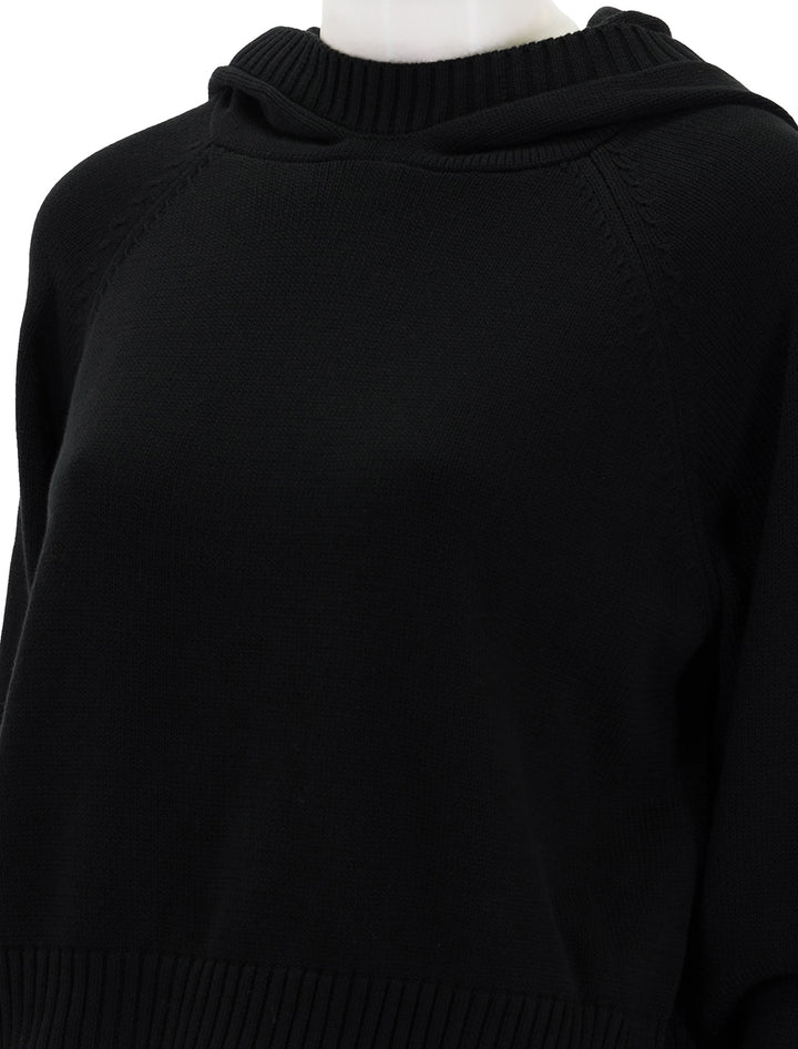 Close-up view of Sundays NYC's trail hoodie in black.