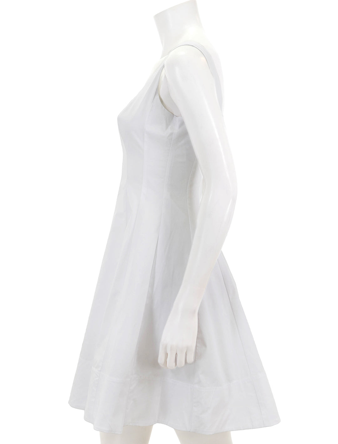 Side view of STAUD's mini wells dress in white.