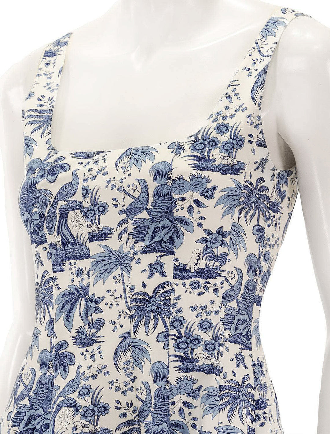 Close-up view of Staud's mini wells dress in blue toile.