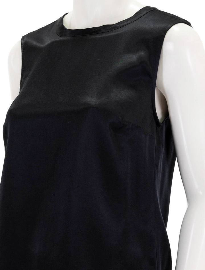 Close-up view of Nation LTD's rachel tie back shell tank in black.