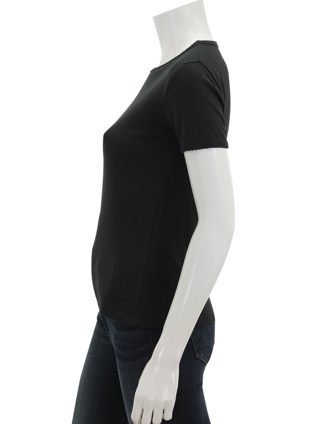 Side view of Goldie Lewinter's short sleeve pointelle tee in black.