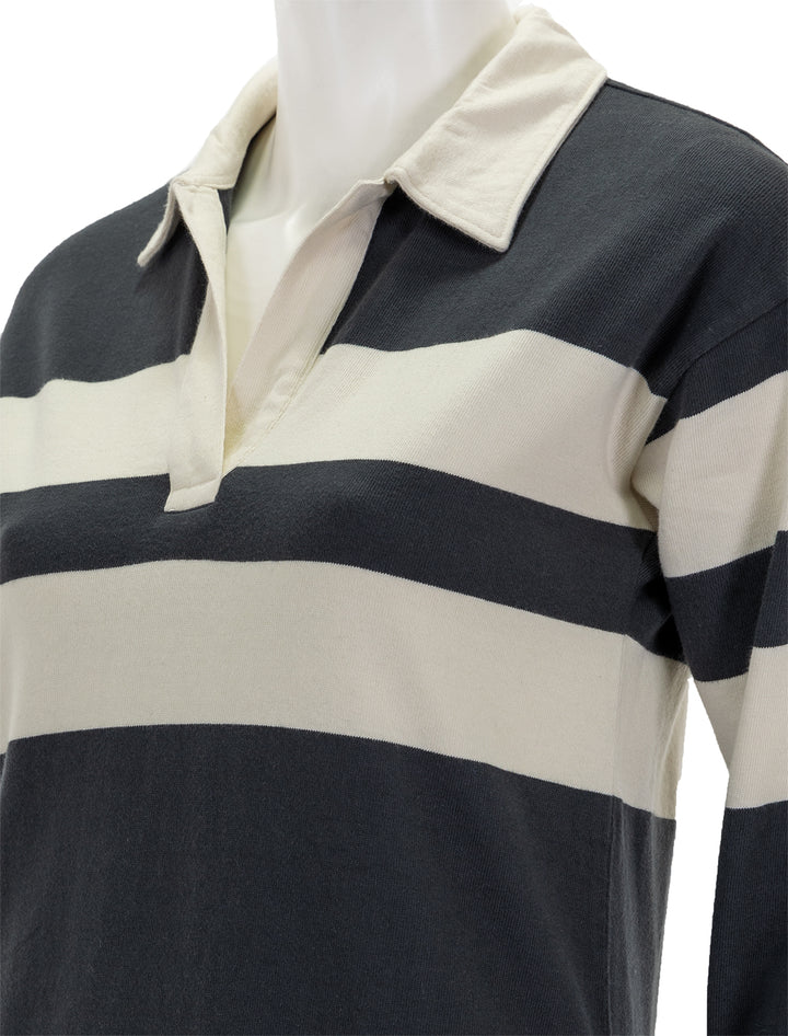 Close-up view of Faherty's rugby jersey polo dress in open stripe.