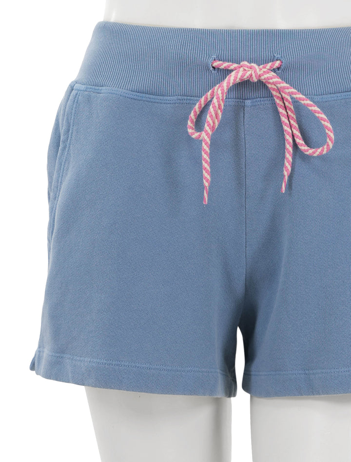 Close-up view of Sundry's gym shorts with contrast cord in pigment capri.