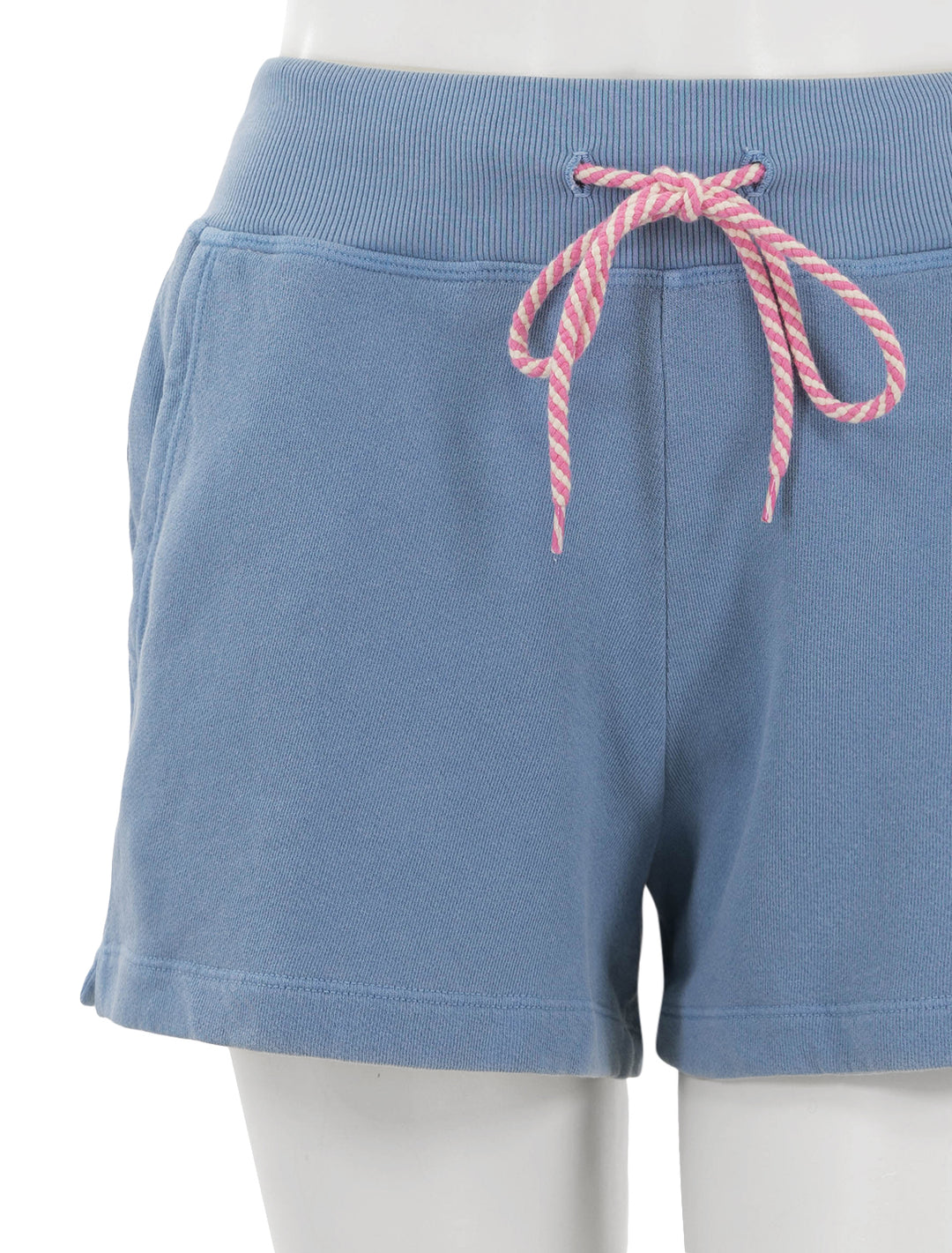 Close-up view of Sundry's gym shorts with contrast cord in pigment capri.