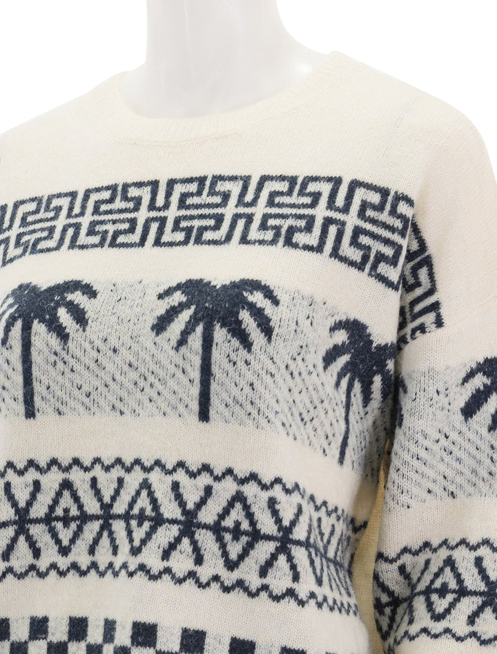 close up view of palm fairisle sweater in oatmilk