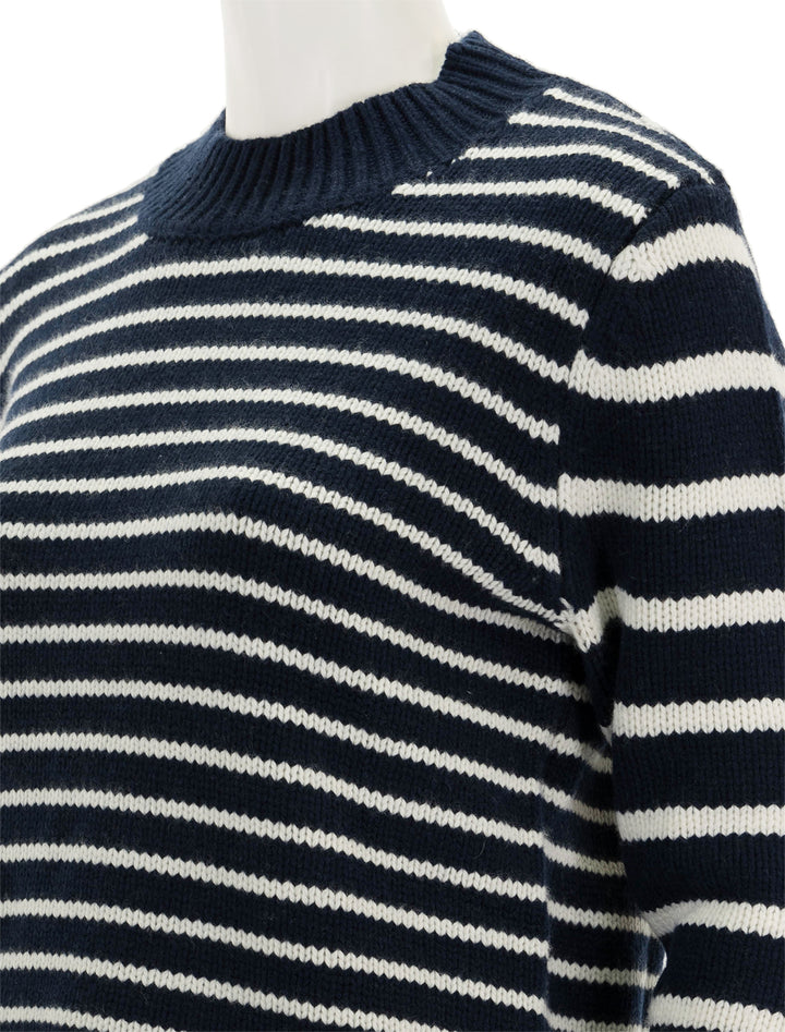 Close-up view of KULE's the brandy in navy and white stripe.