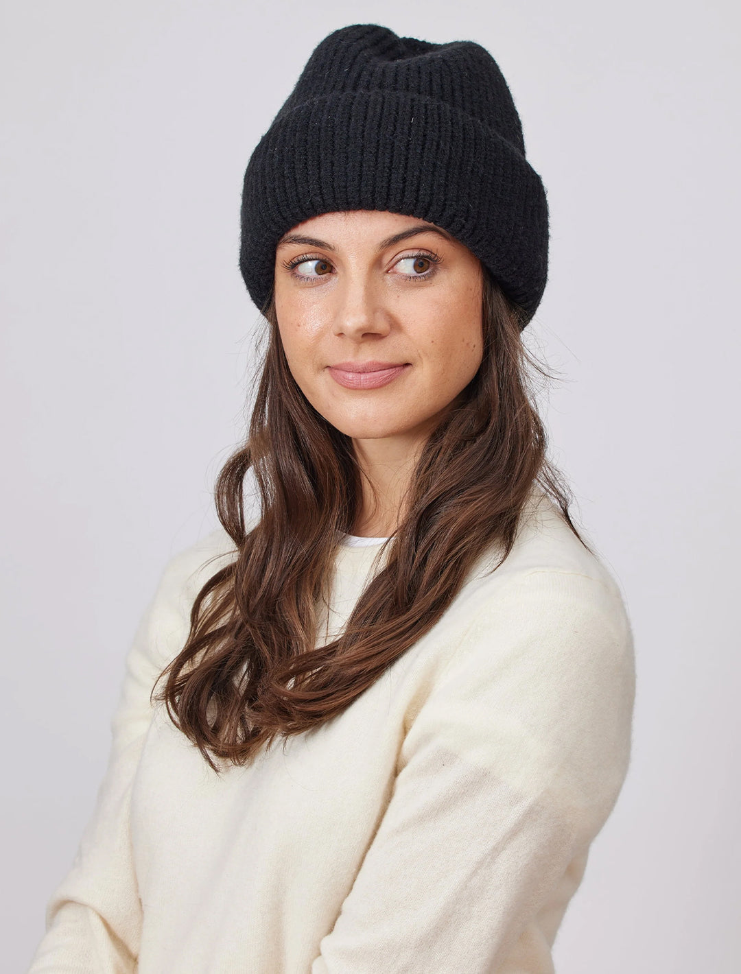 Model wearing Hat Attack's Major Beanie in Black.