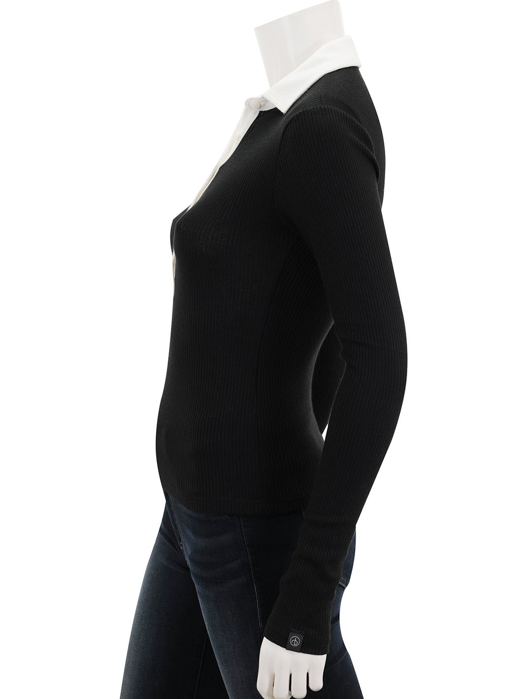 side view of knit colorblock long sleeve polo in black