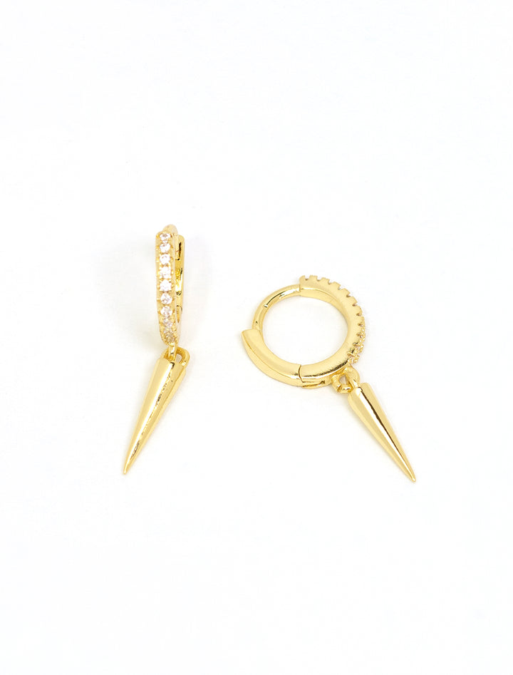 Stylized laydown of Jonesy Wood's axel hoops.