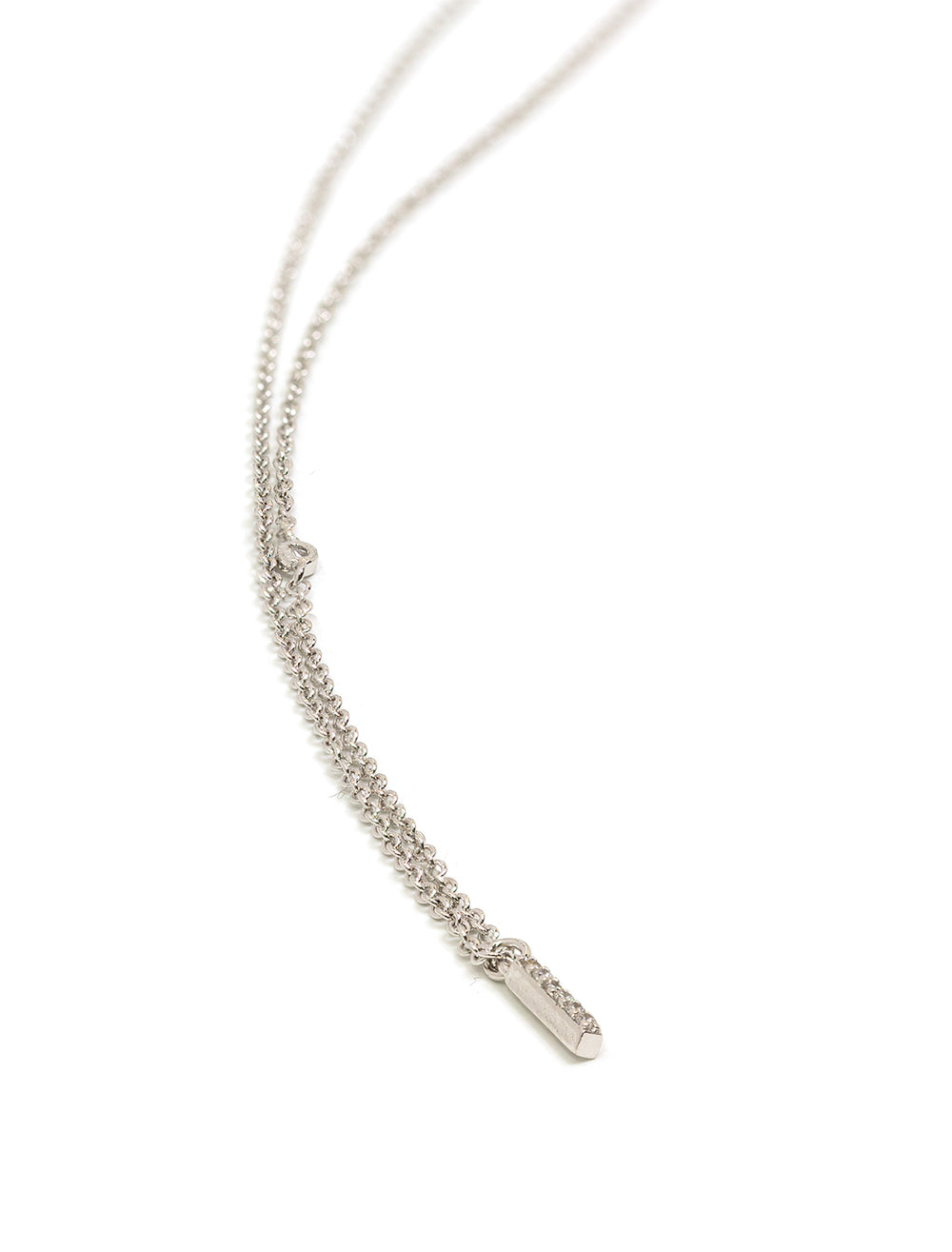 Stylized laydown of Tai Jewelry's Silver Chain Necklace with CZ Stick and Offset CZ.