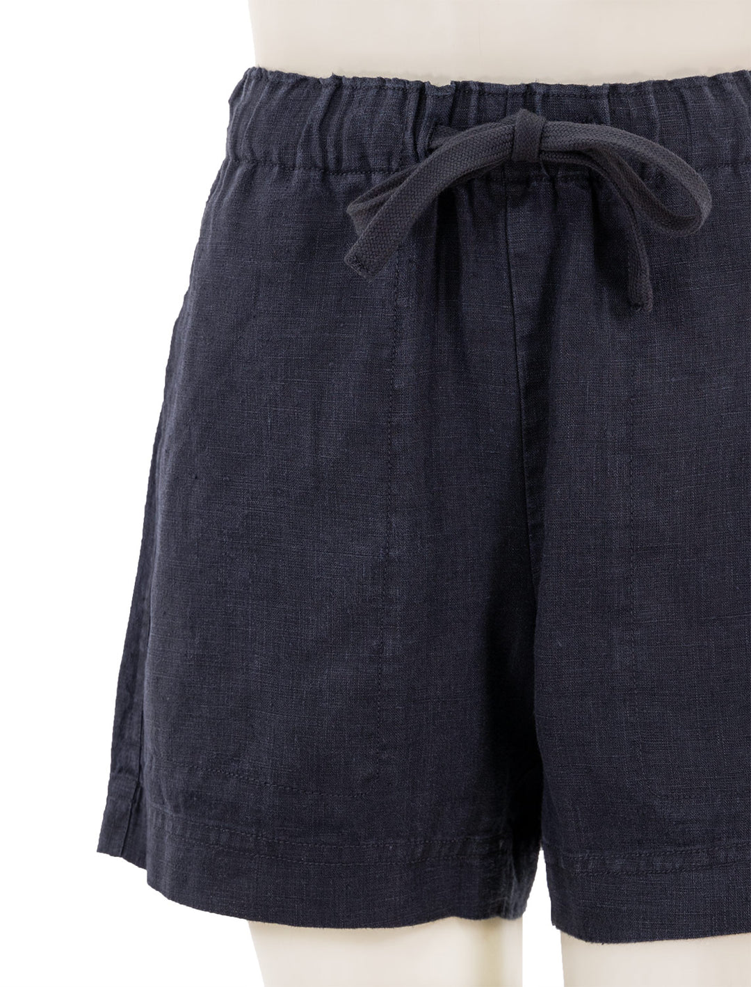Close-up view of Vince's mid waist tie front pull on short in coastal.