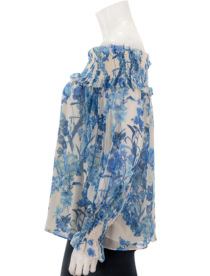 Side view of Cara Cara's patrizia top in blue floral.
